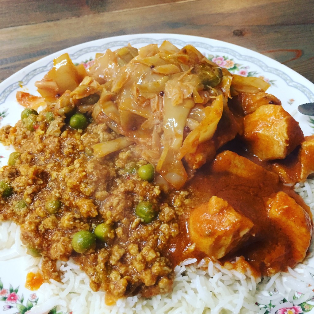A plate of curry and rice from This and That cafe