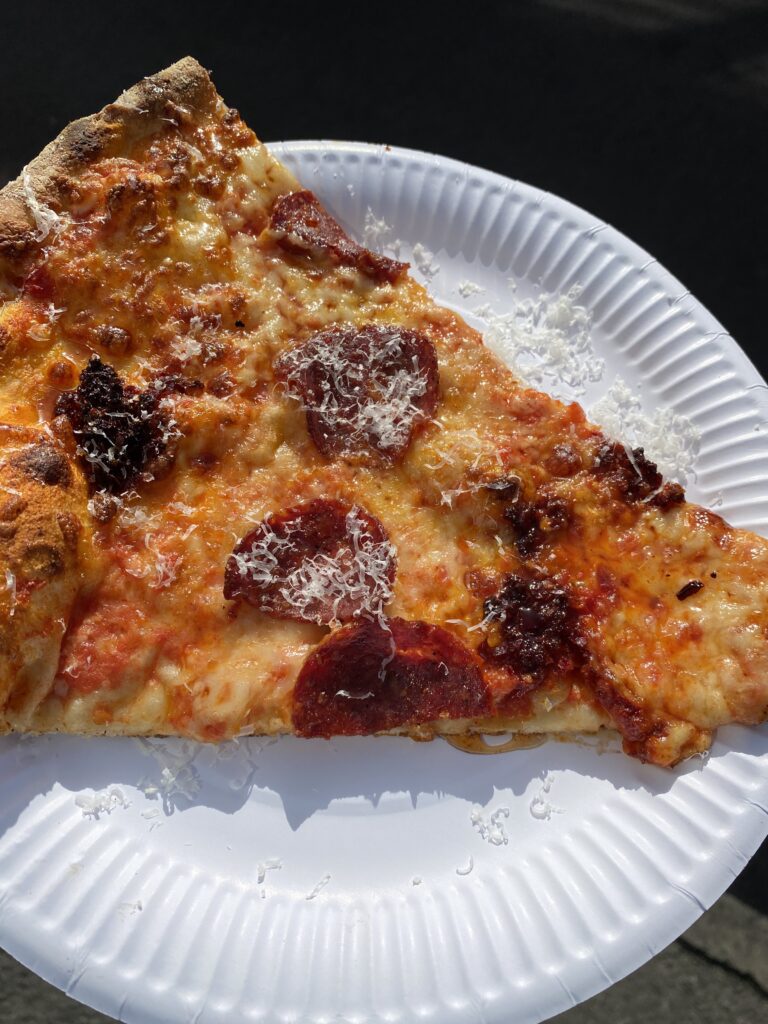 A slice of pizza from Nells